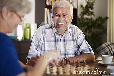 Senior couple playing chess Stock Photo