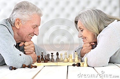 Senior couple playing chess Stock Photo