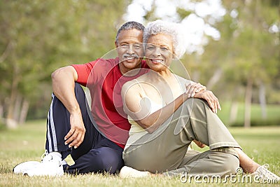 Senior Couple Resting After Exercise Stock Photo