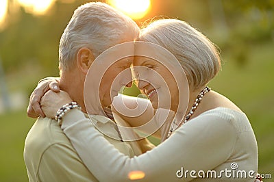 Senior couple resting outdoors Stock Photo