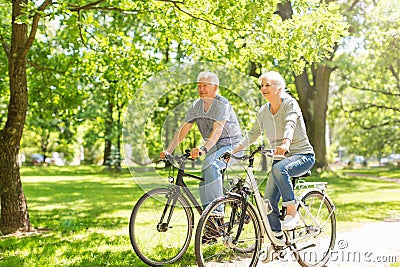 Senior Couple Riding Bikes Stock Photo