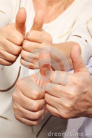 Senior couple show big finger Stock Photo