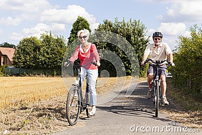 Senior couple at summer bike trip Stock Photo