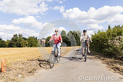 Senior couple at summer bike trip Stock Photo