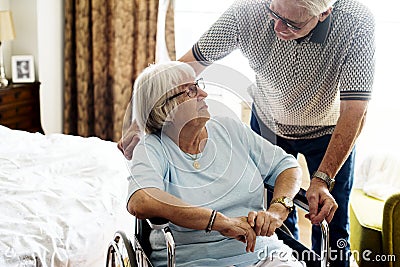 Senior couple taking care of each other Stock Photo