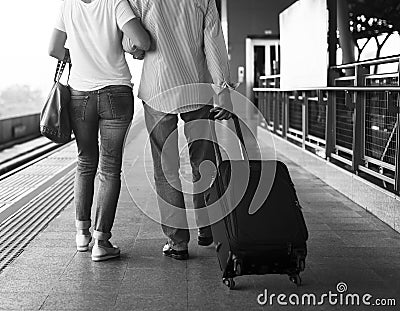 Senior couple traveling train station Concept Stock Photo