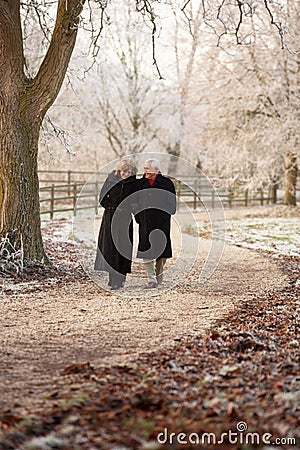 Senior Couple On Winter Walk Stock Photo