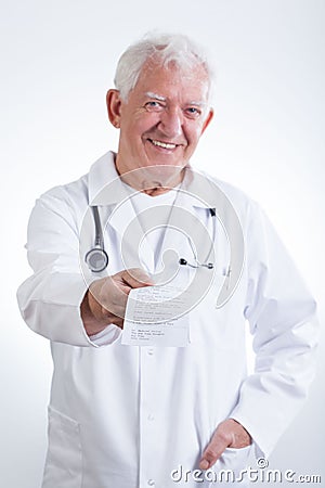 Senior doctor giving prescription Stock Photo