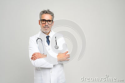 Experienced confident senior doctor with grey hair Stock Photo