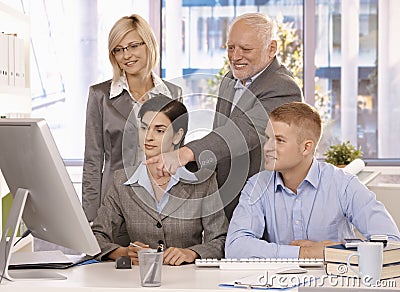 Senior executive working with businessteam Stock Photo