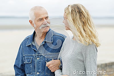 Senior father with adult daughter at sea Stock Photo