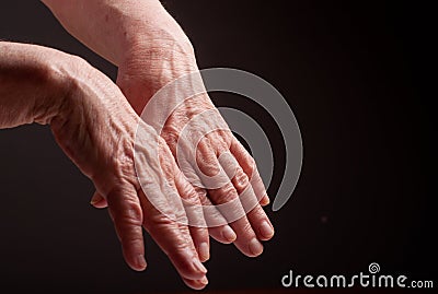 Senior hands. Suffering from pain and rheumatism Stock Photo