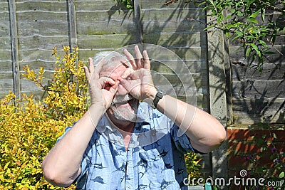 Senior happy playful man. Stock Photo