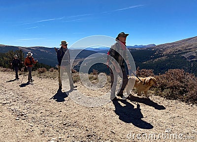 Senior hikers hiking in the White River National Forest Editorial Stock Photo