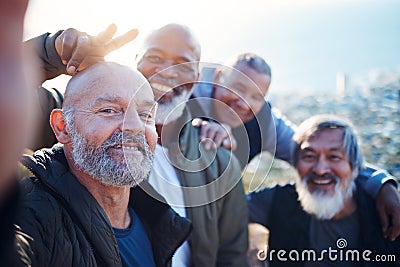 Senior hiking, selfie and nature exercise of elderly men together with peace sign. Friends, trekking adventure and Stock Photo
