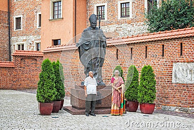 Senior Indian couple taking photo near monument of Pope Saint John Paul II Editorial Stock Photo