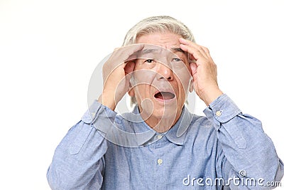 Senior Japanese man has lost his memory Stock Photo