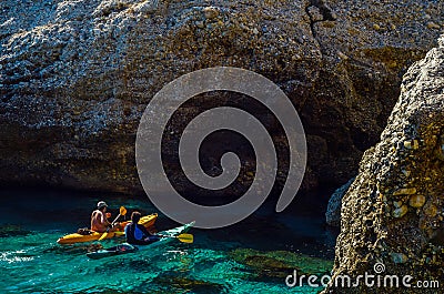 Senior kayaker on a kayak by the sea, active water sport and lei Editorial Stock Photo