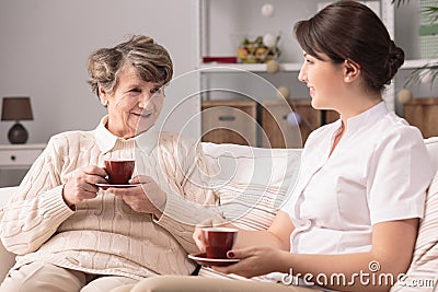 Senior lady with caregiver Stock Photo