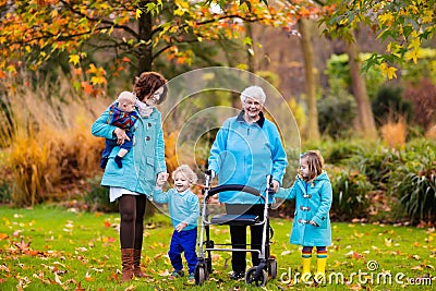 Senior lady with walker enjoying family visit Stock Photo