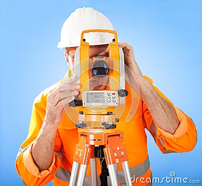 Senior land surveyor with theodolite Stock Photo