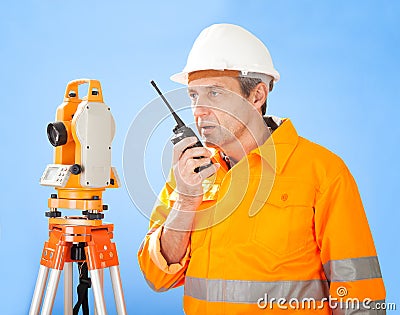 Senior land surveyor with theodolite Stock Photo