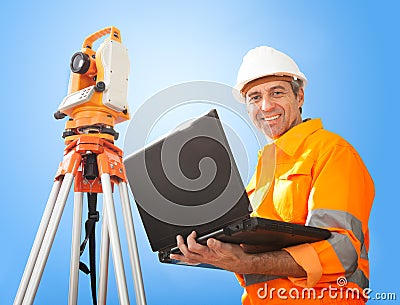 Senior land surveyor with theodolite Stock Photo