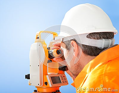 Senior land surveyor with theodolite Stock Photo