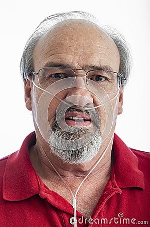 Adult man wearing an O2 cannula for emphysema Stock Photo