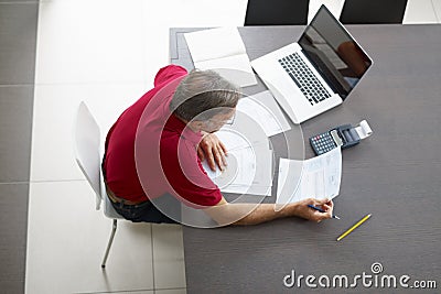 Senior man checking home finances Stock Photo