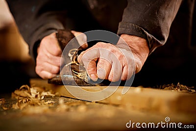 Senior man doing woodworking Stock Photo