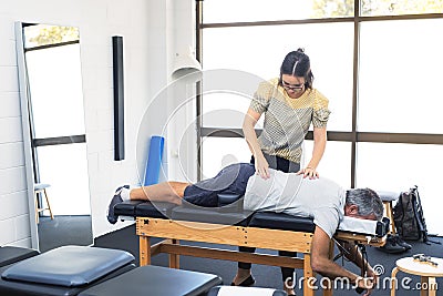 Senior man having chiropractic adjustment. Stock Photo