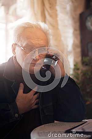 Serious sign of a heart attack Stock Photo