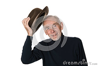Senior man raising his hat Stock Photo