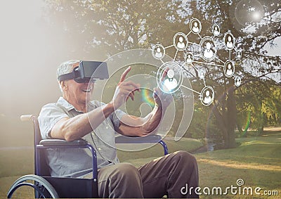 Senior man sitting on wheelchair using virtual reality headset and network connecting icons Stock Photo