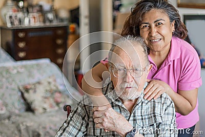 Senior Man with their Caregiver at Home. Concept of Health Care for Elderly Old People, Disabled Stock Photo