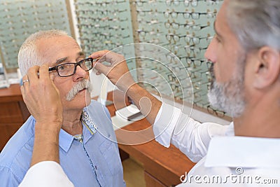 Senior man trying new eyeglasses Stock Photo