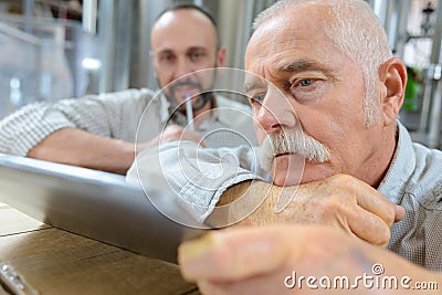 senior man websurfing on tablet Stock Photo