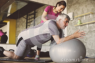 Senior man workout in rehabilitation center. Stock Photo