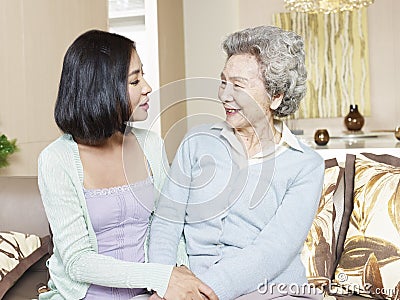Senior mother and adult daughter Stock Photo