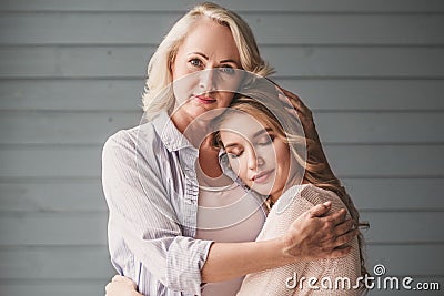 Senior mum and adult daughter Stock Photo