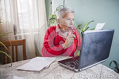 Shocking amount of money an old woman has to pay for her bills Stock Photo