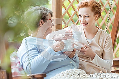 Pensioner drinking tea Stock Photo