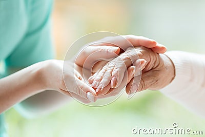 Senior person thanking the nurse Stock Photo