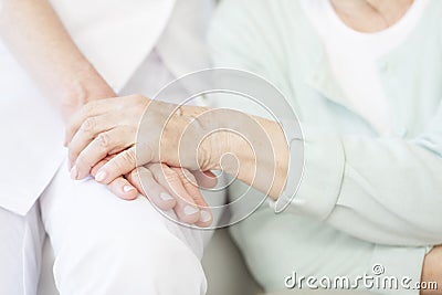 Senior person thanks the nurse Stock Photo