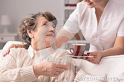 Senior and private carer Stock Photo