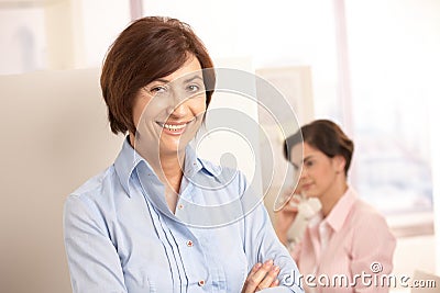 Senior professional woman with assistant Stock Photo