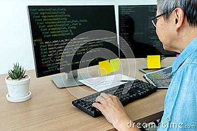 Senior programmer work with Developing programming Stock Photo
