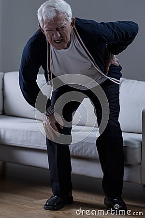 Senior with rheumatism Stock Photo