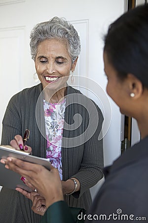 Senior signs a Petition Stock Photo